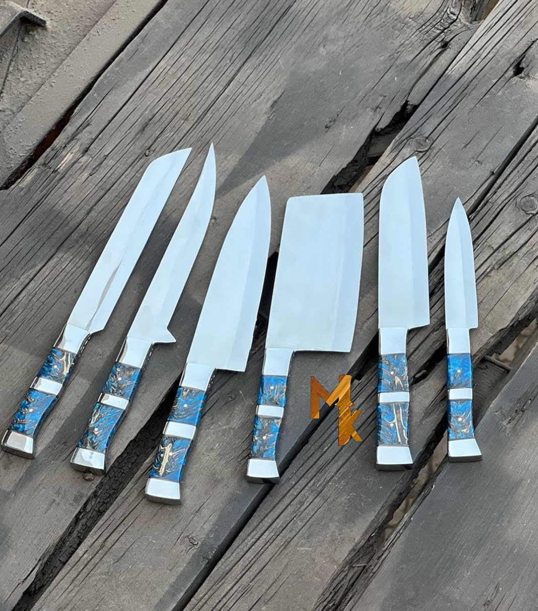 "An assortment of high-quality kitchen knives set for home chefs featuring sharp stainless steel blades and ergonomic handles, ideal for precise slicing, dicing, and chopping various ingredients."