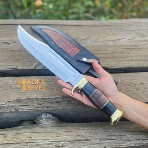 Crocodile Dundee Knife - A rugged and versatile knife with a stainless steel blade, ergonomic handle, and custom leather sheath. Perfect for outdoor adventures, survival situations, and everyday tasks.