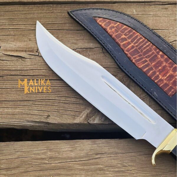 Crocodile Dundee Knife - A rugged and versatile knife with a stainless steel blade, ergonomic handle, and custom leather sheath. Perfect for outdoor adventures, survival situations, and everyday tasks.