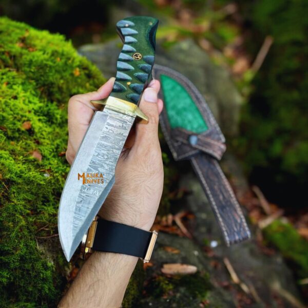 Stainless Steel Damascus Blade Handmade Hunting Bowie Knife with a G10 green handle, brass guard, and custom leather sheath. Perfect for collectors and outdoor enthusiasts